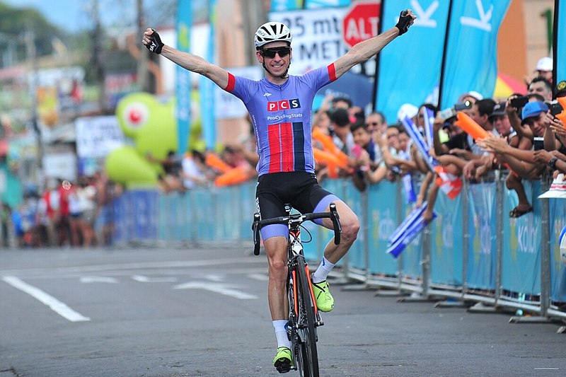 Cyclist celebrating winning